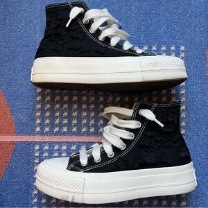 Converse high-top black sneakers with flowers